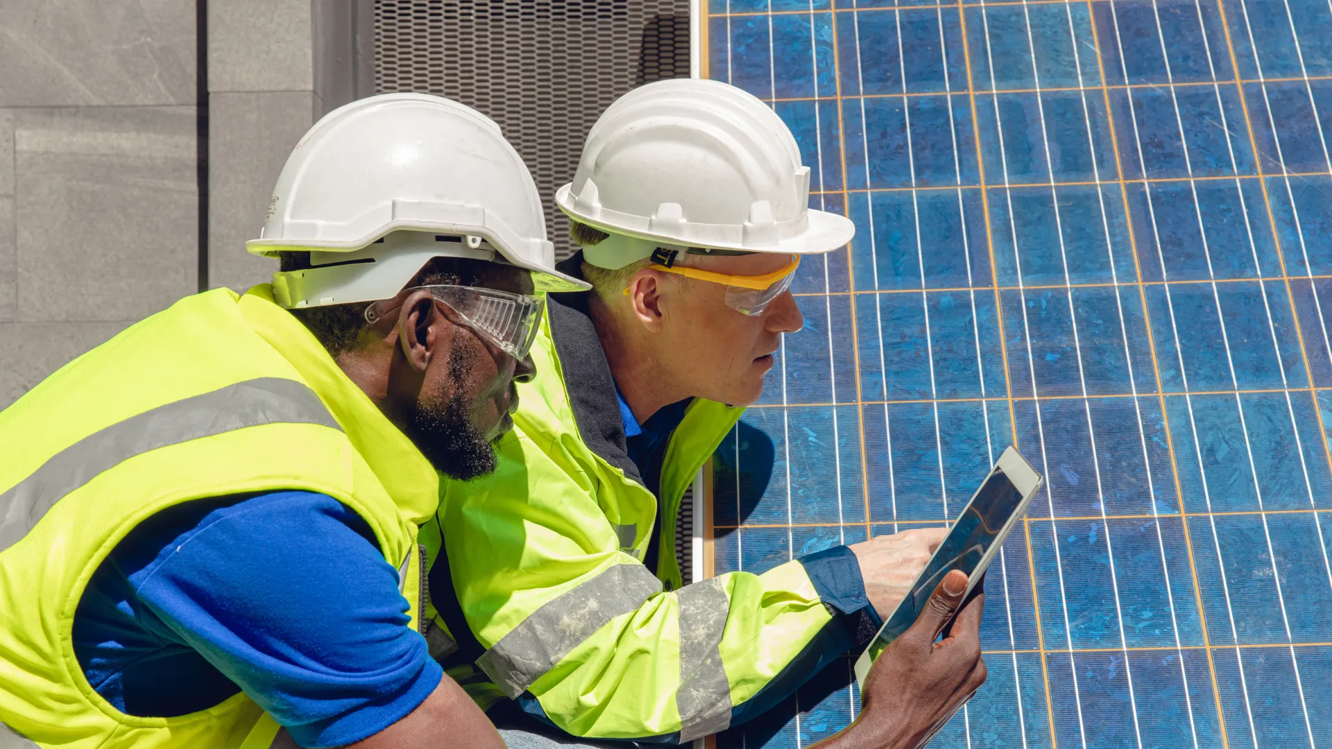 technicians checking PV modules